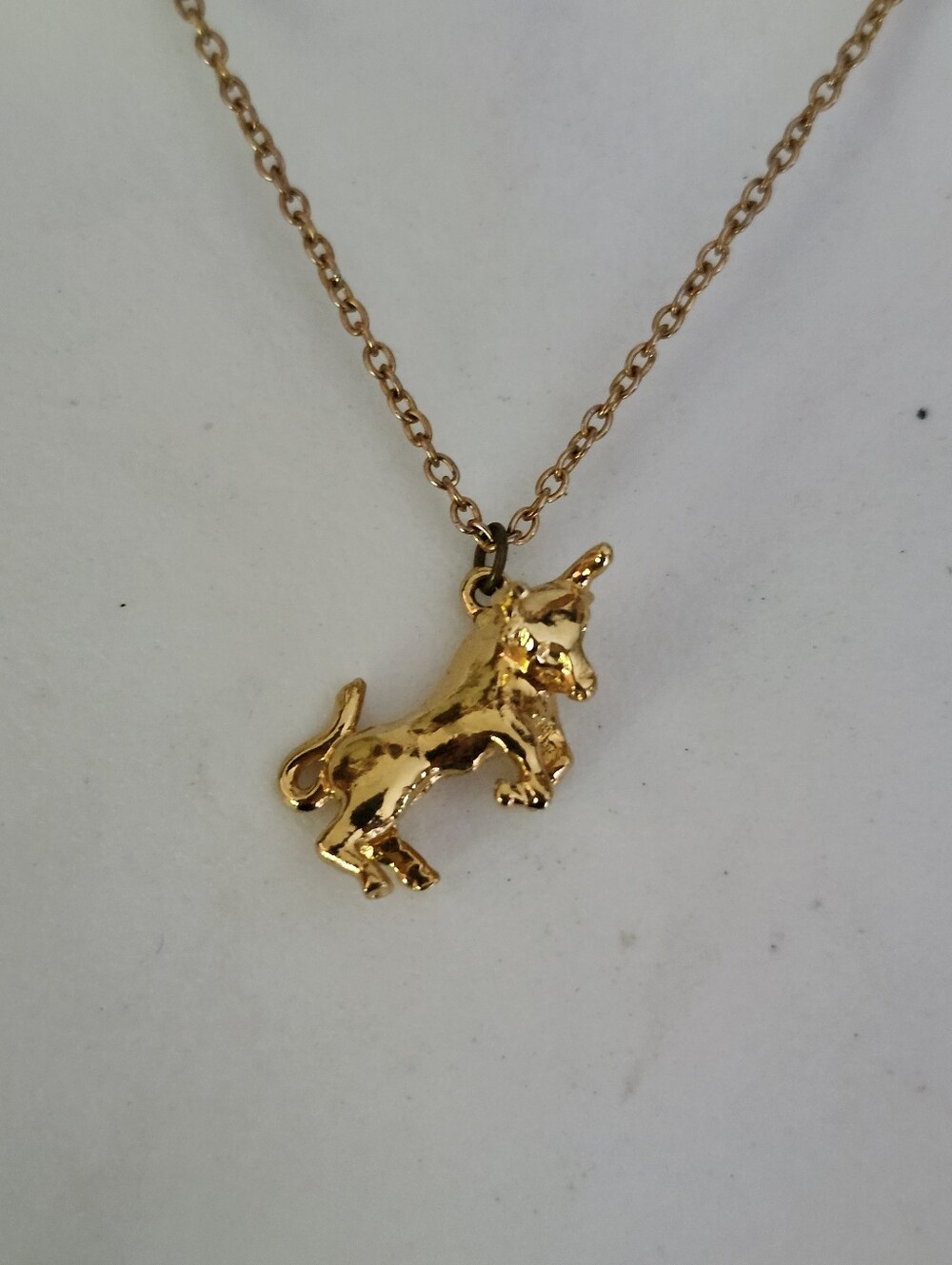 Gold Tone Bucking Bull Pendant Necklace